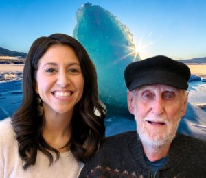 Krista and Dietrich, a young woman and an older man, smile in front of a photoshopped background of a blue iceberg background.